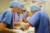 Baby in operating theatre